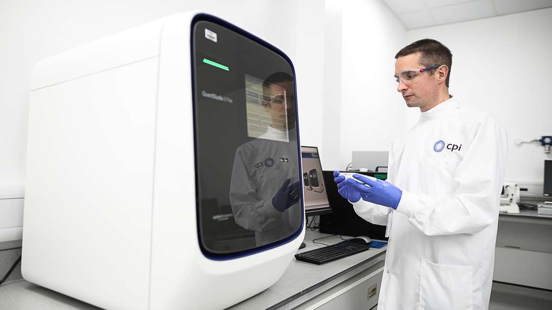 Craig working in photonics lab Craig working in photonics lab