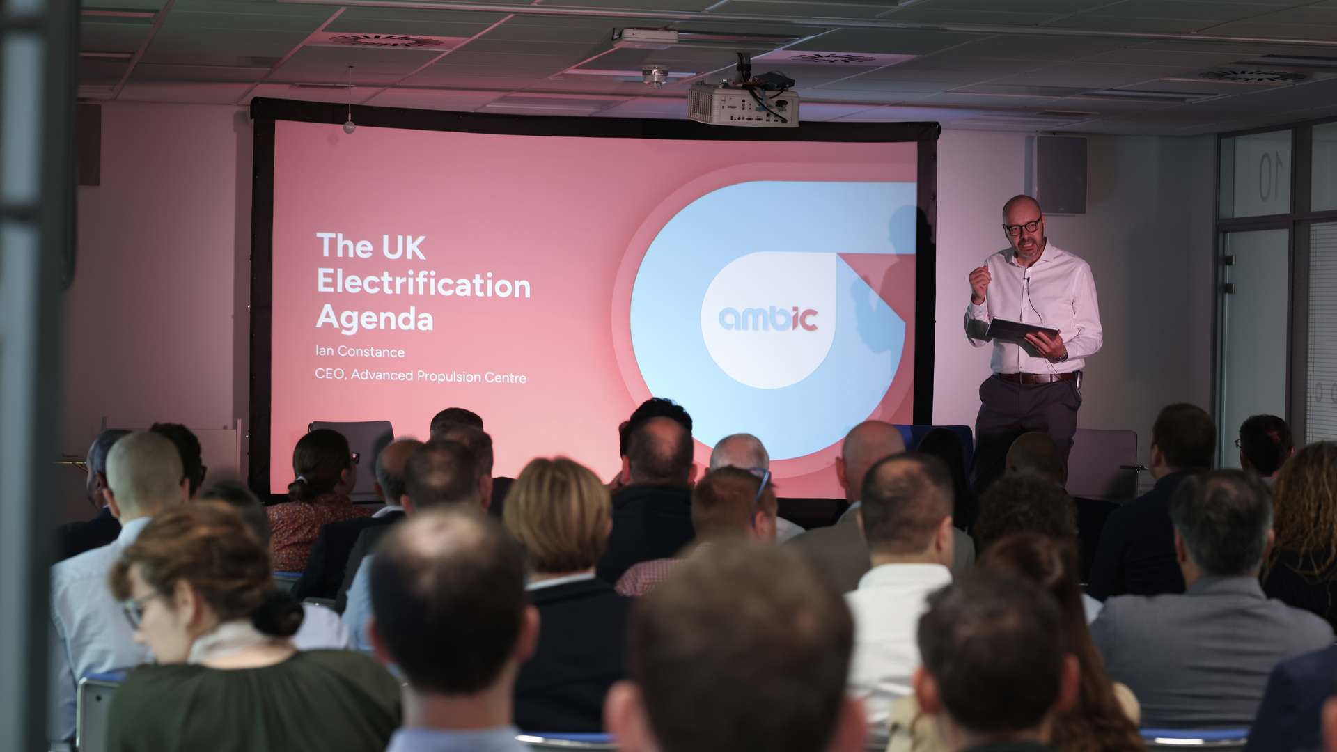 Ian Constance, CEO of Advanced Propulsion Centre, presenting the AMBIC Launch event in June 2025. Ian Constance, CEO of Advanced Propulsion Centre, presenting the AMBIC Launch event in June 2025.