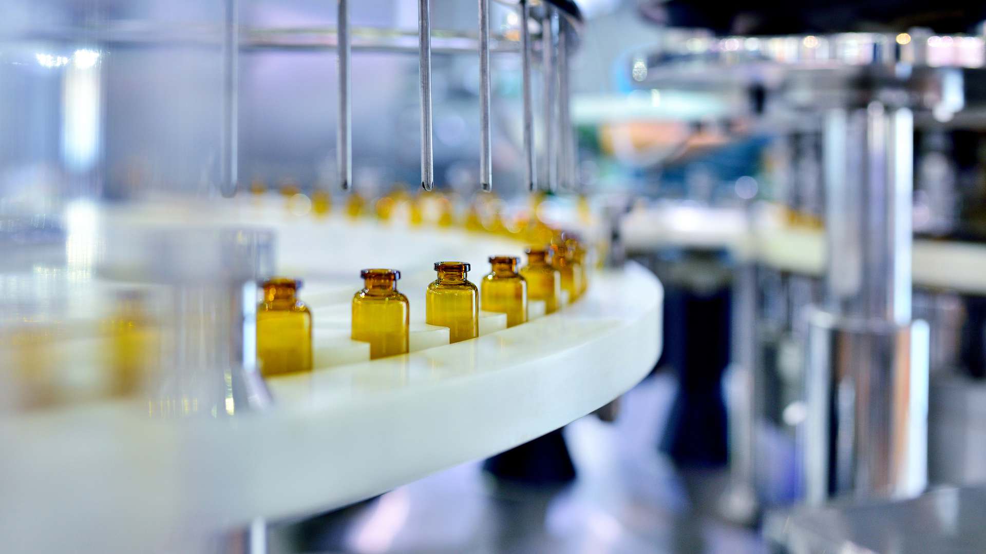 A photo of a pharma factory's medicines bottling line A photo of a pharma factory's medicines bottling line