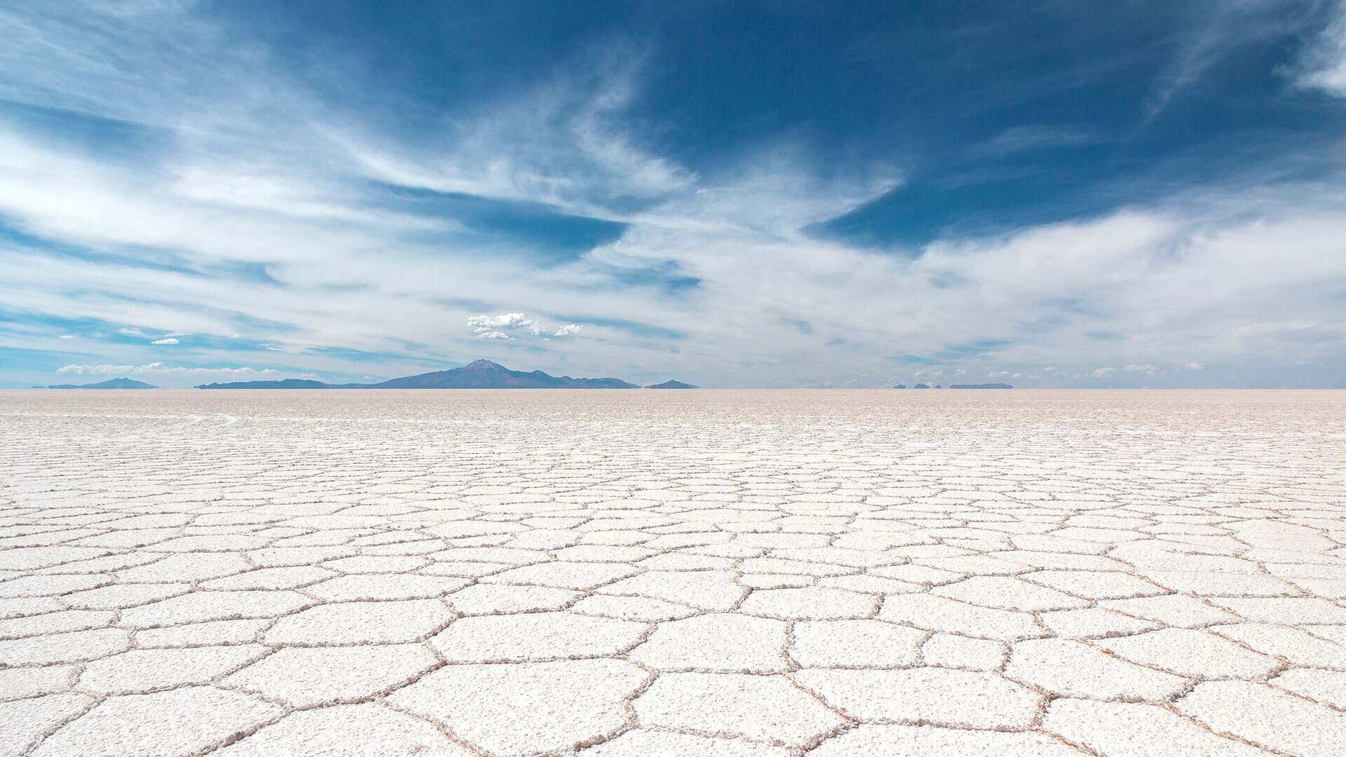 Photo of Salar de Uyuni, Bolivia where workers drill for lithium-rich spots Photo of Salar de Uyuni, Bolivia where workers drill for lithium-rich spots