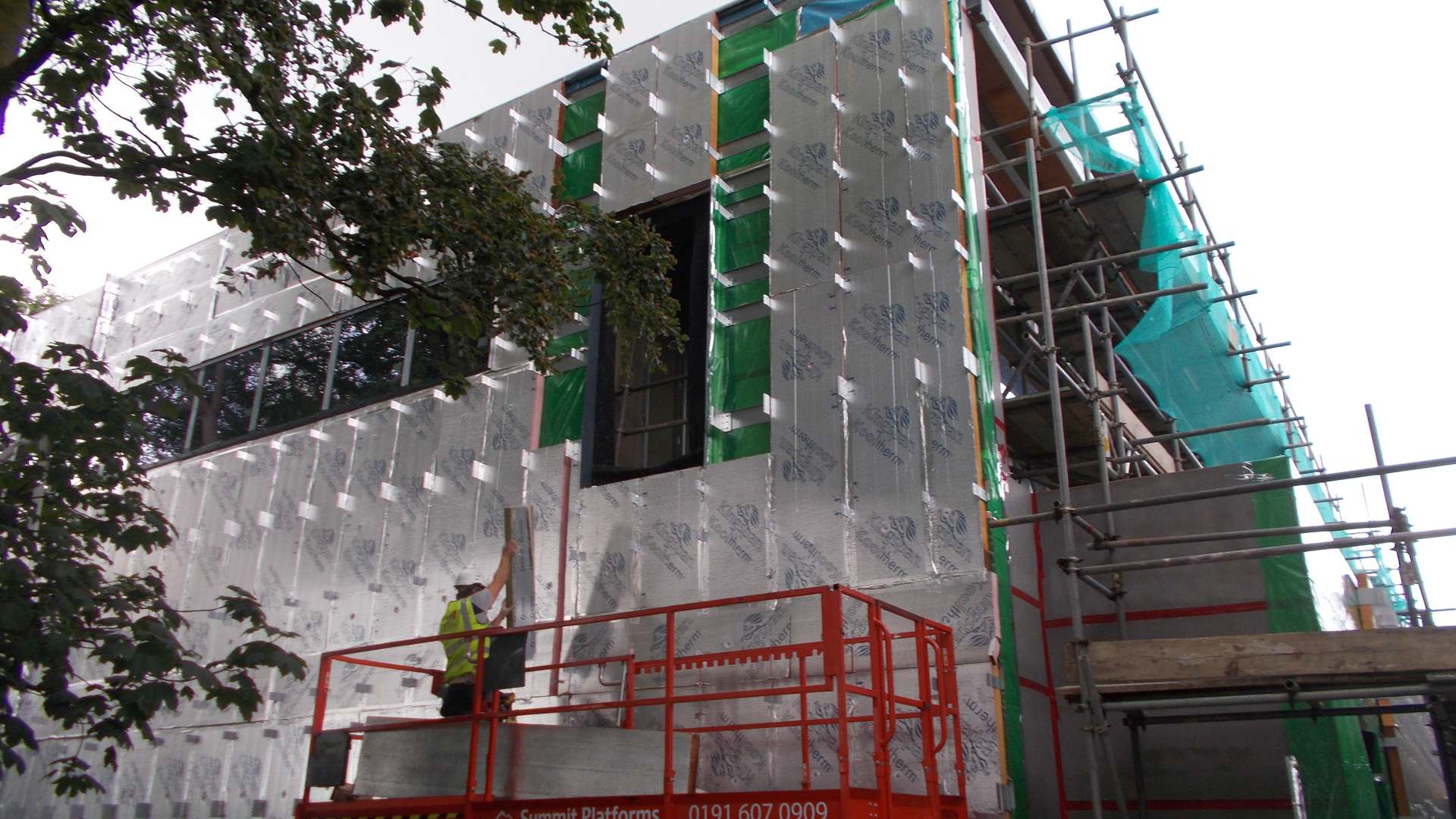 Cladding is fitted to the healthcare photonics facility Cladding is fitted to the healthcare photonics facility