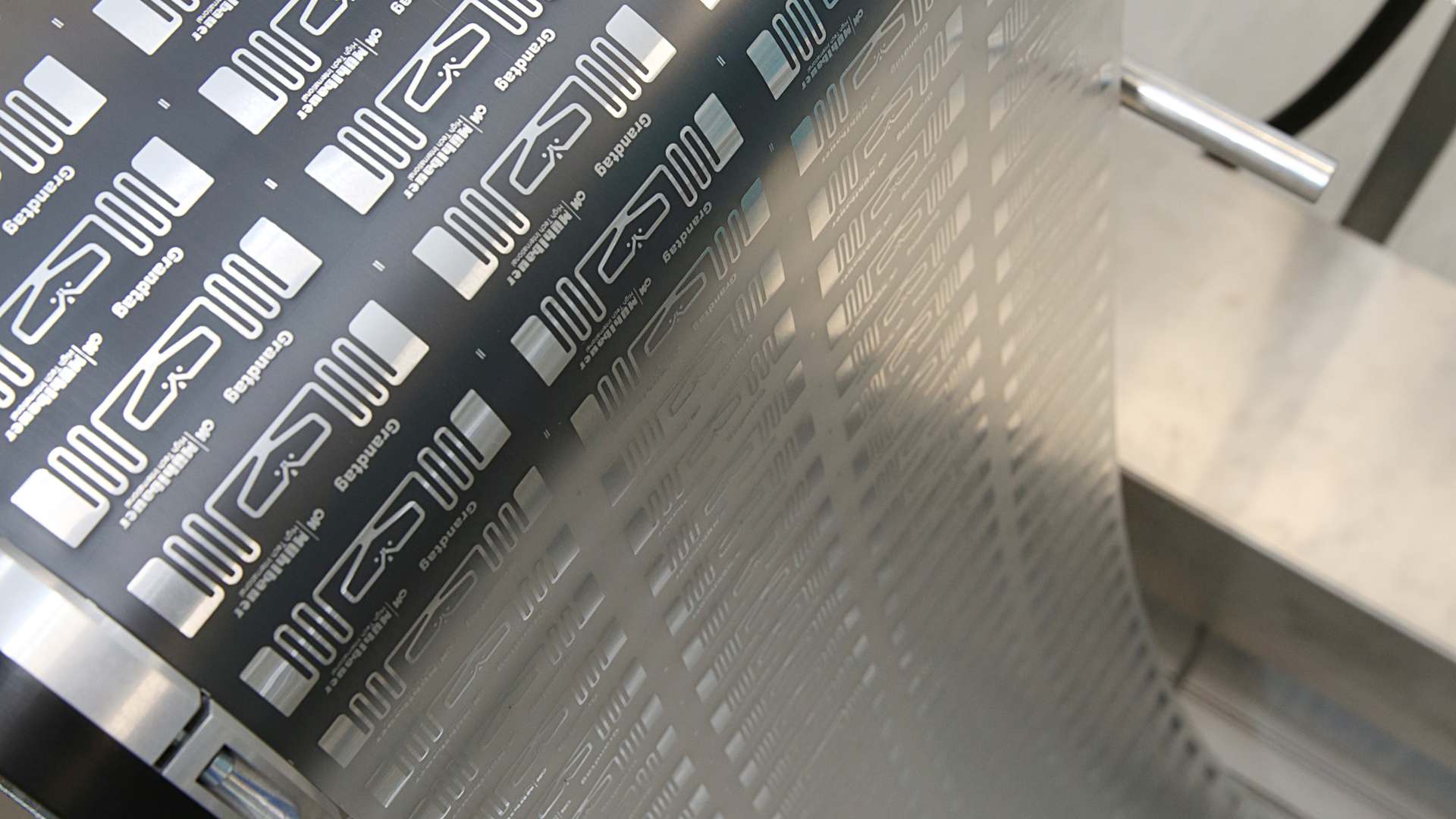 A photo of roll-to-roll printing at CPI A photo of roll-to-roll printing at CPI